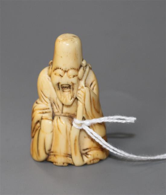 An 18th century Japanese ivory netsuke of Fukurokuju, 5cm